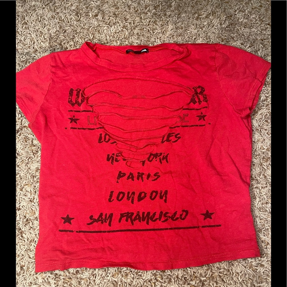 Very cute red crop top with a couple slits in the chest area
